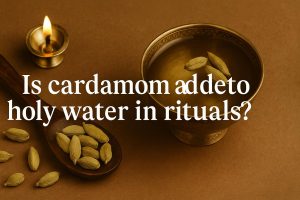 Is cardamom added to holy water in rituals?